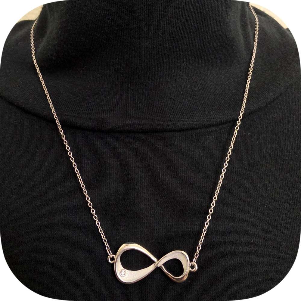 Silver-Tone Infinity Symbol Pendant Necklace with Crystal Accent